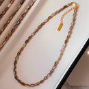 Collar Perlas Ovaladas en Tonos Tierra