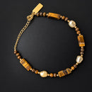 Pulsera de Ojo de Tigre y Perla