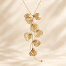 Conjunto Collar y Bracalete Cascada de Flores Doradas