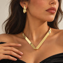 Conjunto dorado de collar y aros geométricos