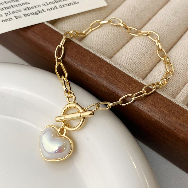 Pulsera dorada Perla Corazón