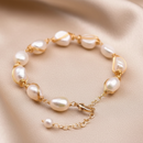 Pulsera Triple Armonía: Perlas Barrocas y Destellos del Mar