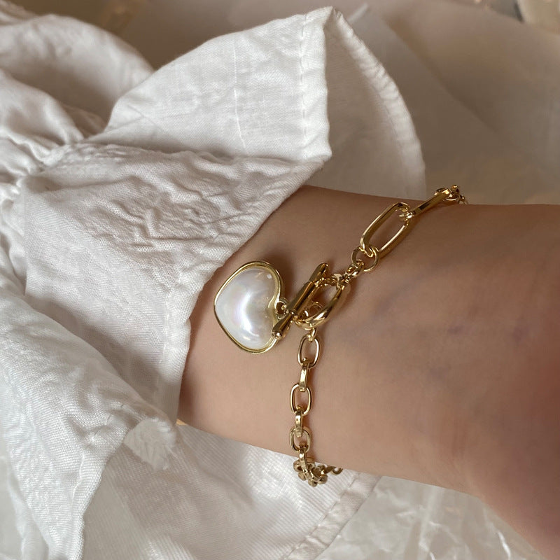 Pulsera dorada Perla Corazón