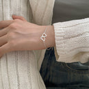 Pulsera Corazones Entrelazados