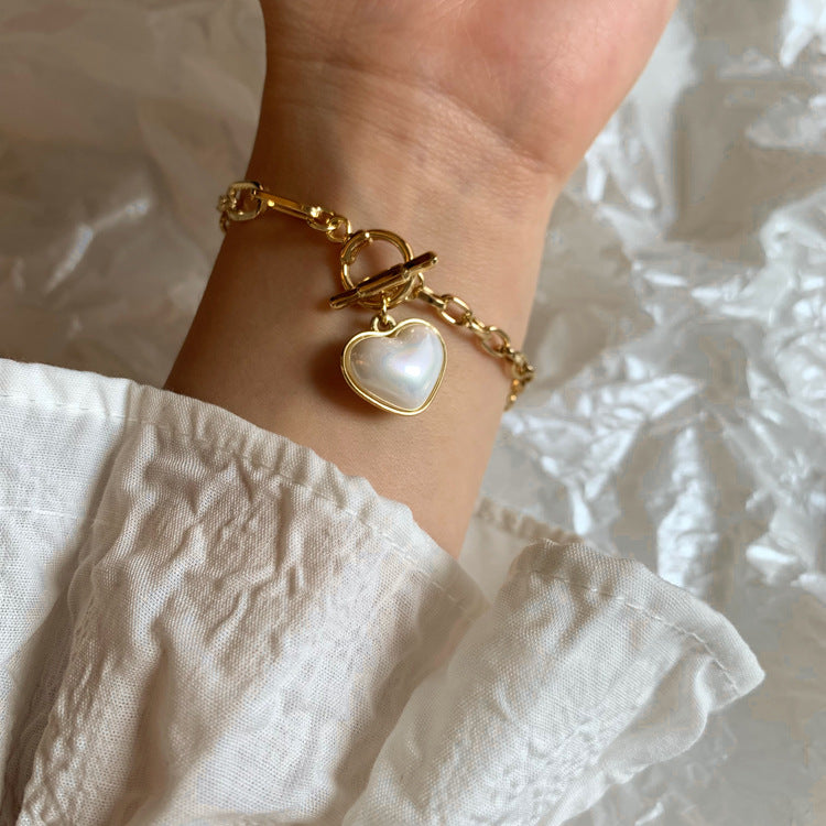 Pulsera dorada Perla Corazón