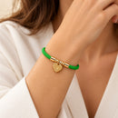 Pulsera de Cordón Verde con Hoja Dorada