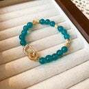 Pulsera Dorada y Cristales Azules