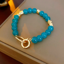 Pulsera Dorada y Cristales Azules