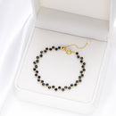 Pulsera dorada Espinela Negra