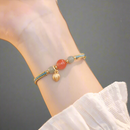 Pulsera Dorada Jade y Fresa